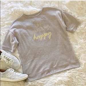 Liz Claiborne • “life makes me happy” gold tee